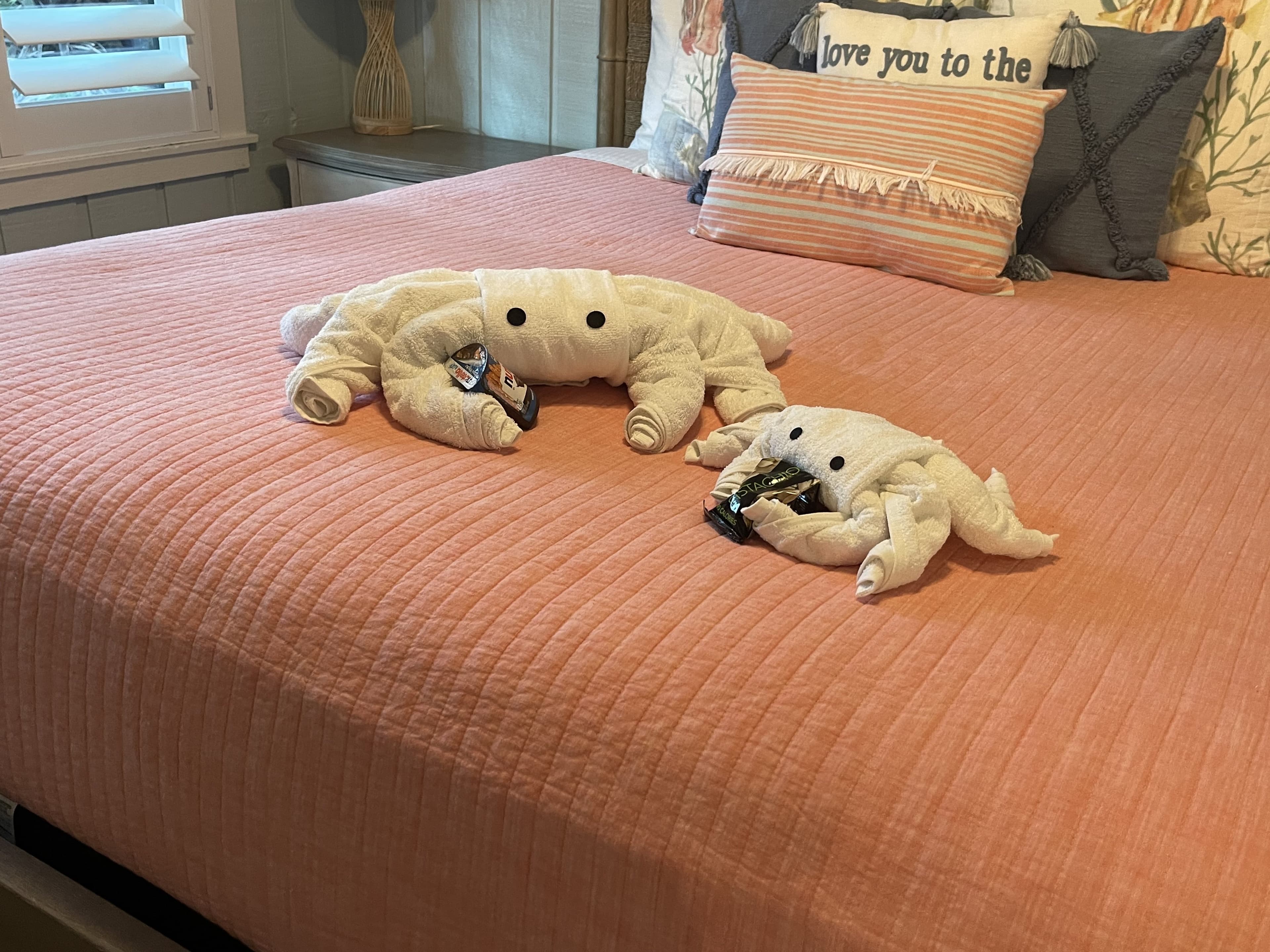 Freshly made coastal-themed bedroom ready for Airbnb guests