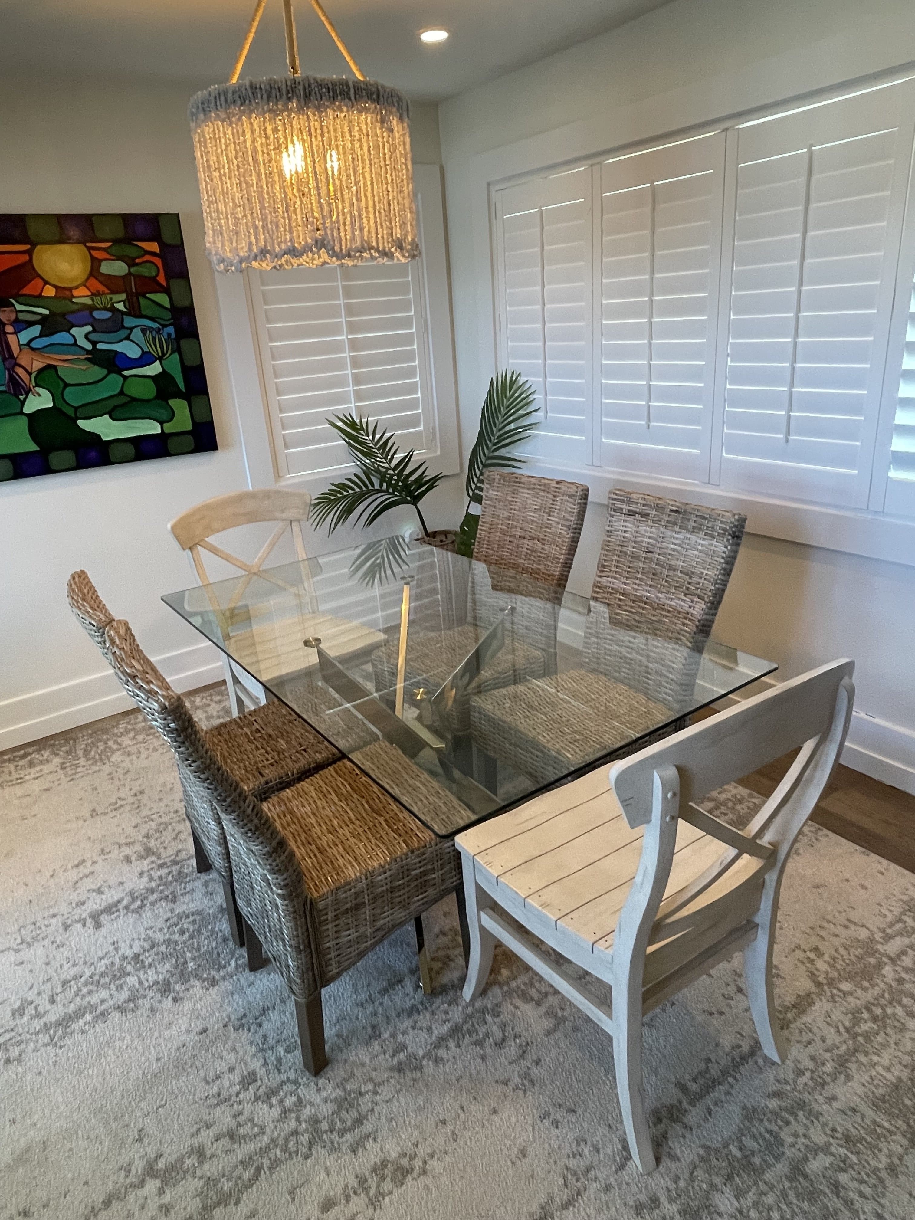 Elegant dining room cleaned and staged for guest arrival by Dazzle Divas Cleaning