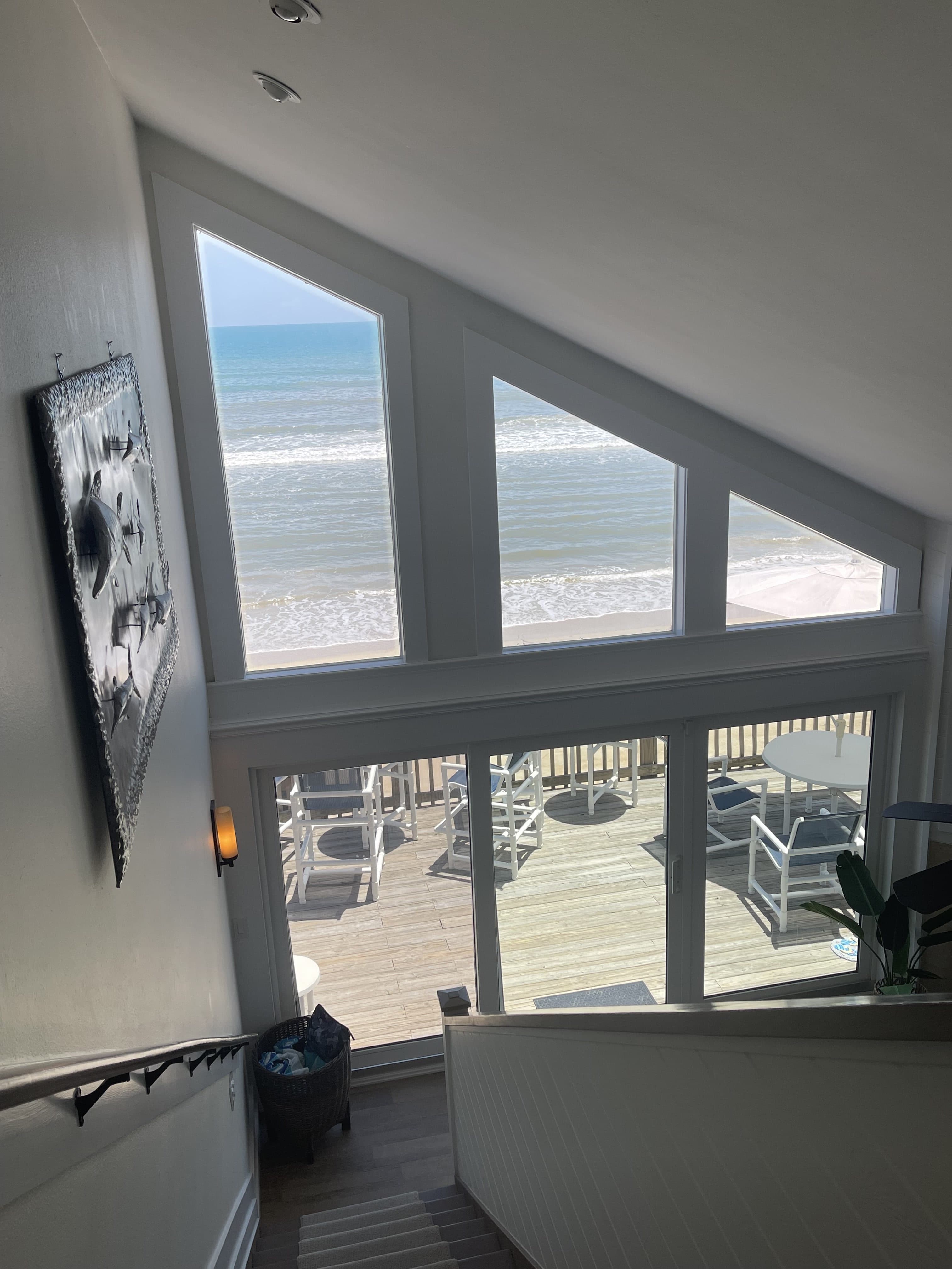 Clean oceanfront stairway with an Atlantic coast view in a Volusia County rental